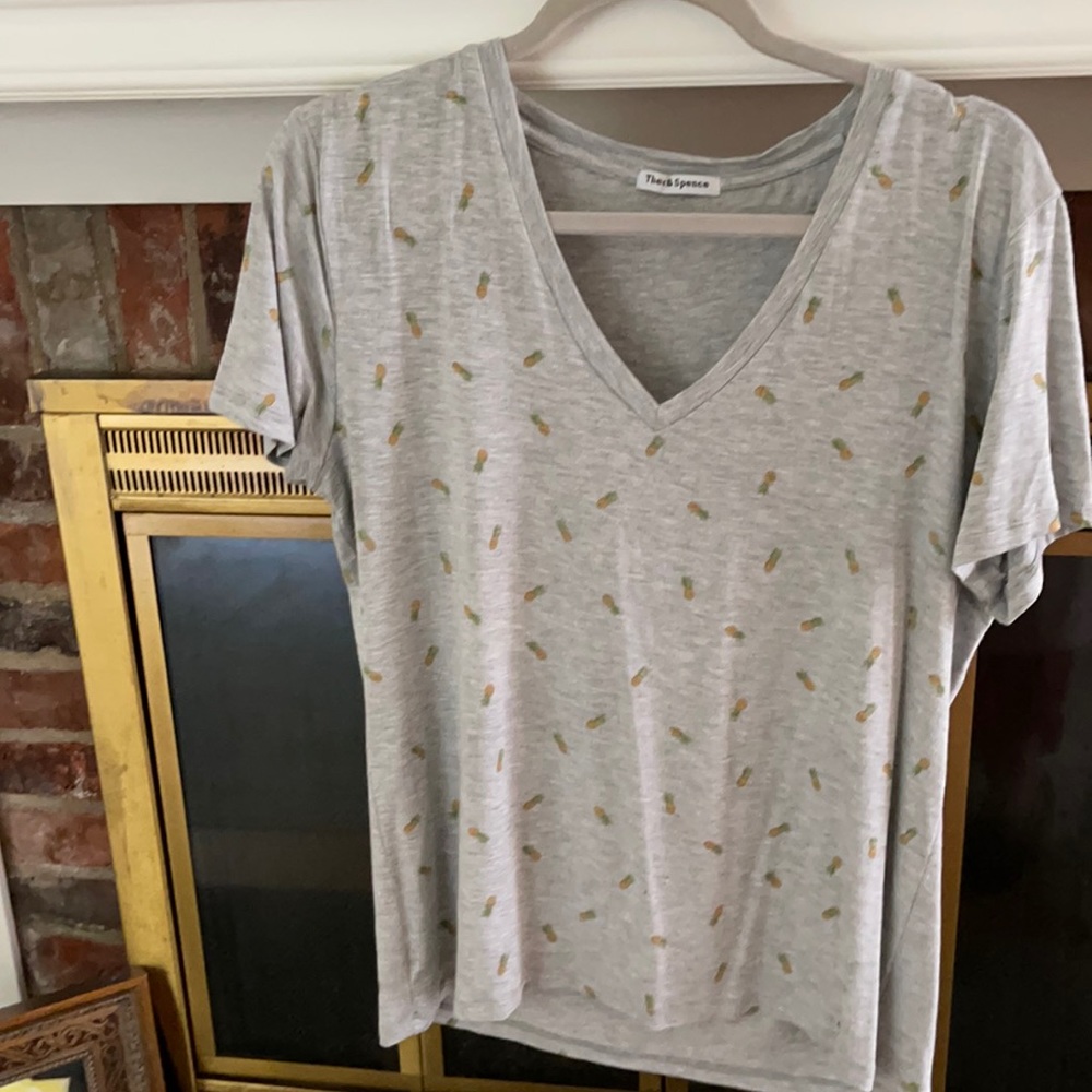 Size Large grey cap sleeve t shirt with pineapples